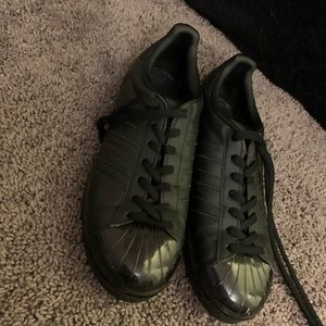 All black all star adidas shoes